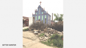 Muro de la iglesia de la aldea de Dong después de la demolición