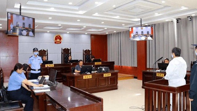 el Tribunal Popular de la ciudad de Dunhuang, en la provincia noroccidental de Gansu, celebró un juicio abierto para juzgar a la miembro de la IDT